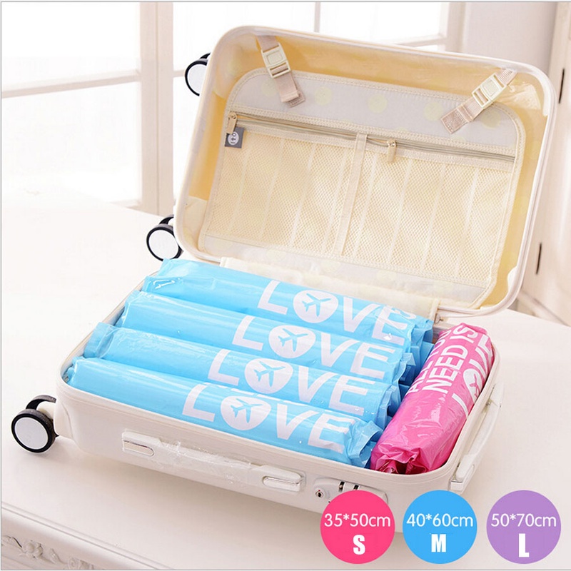 2Pcs / Lot Hand Pressure Hand-Rolled Compressed Space Vacuum Seal Saver Storage Travel Bag Compression Space Saver Color Random