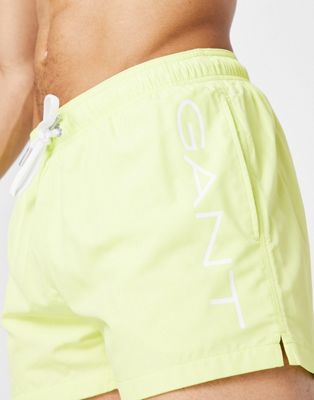 GANT swim shorts in green with side logo | ASOS